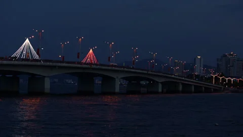 Tran Phu road bridge illuminated at night in Nha Trang, Vietnam Stock Footage 336566149