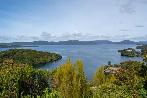 Tranquil Bay View Surrounded by Lush Greenery Stock Photos