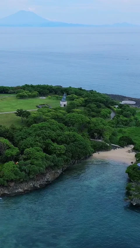 Tranquil Beach Cove Surrounded By Thick Foliage And Stretching Turquoise Waters Stock Footage 326082777