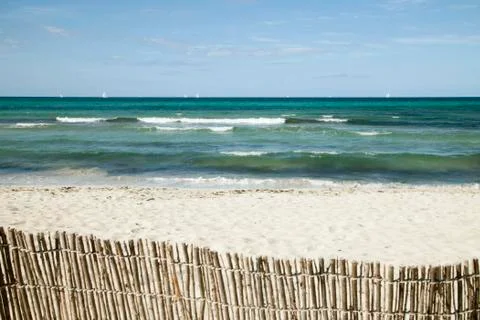 Tranquil beach scene Stock Photos