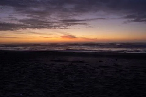 Tranquil Beach Sunset Scene Foto stock
