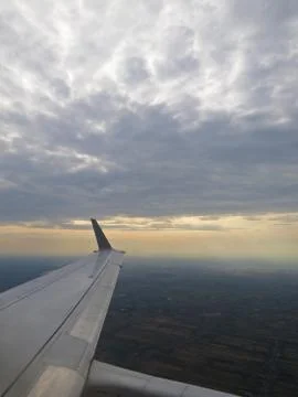 Tranquil Beautiful View From Plane Window at Blue Sky over White Clouds with  Foto stock
