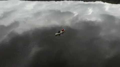 Tranquil Canoe Adventure On Lake with Reflection on Water, Leisure, Aerial 動画素材 156031736