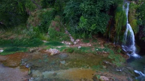 Tranquil Drone Flyover of Provalije Waterfall in Stolac Stock Footage 313299268