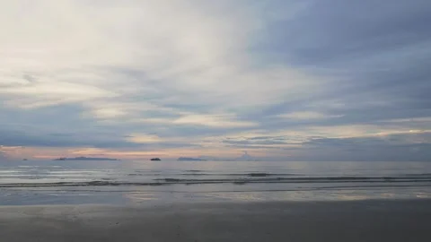 Tranquil evening after tropical sunset over sea Видео 332099678