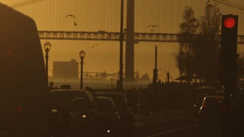 A Tranquil Evening Overlooking the Bridge: Red Traffic Light and People Stock Footage 255838411