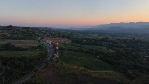 Tranquil Evening View of a Remote Village Nestled in the Valley Stock Footage 326176715