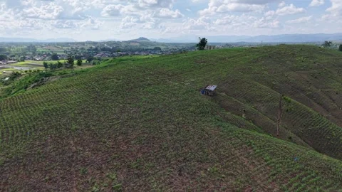 Tranquil Hillside Road and Cloudy Skies – Nature Before Rain Stock Footage 310883294