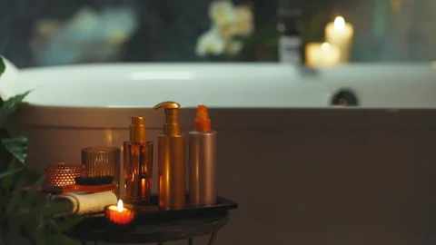Tranquil Home Spa: Steamy Bath with Luxurious Products Stock Footage 311074945