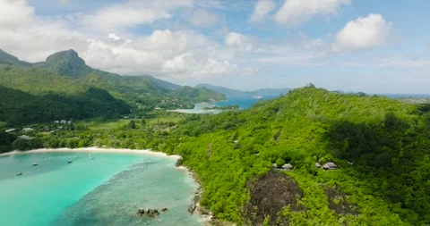 Tranquil lagoon surrounded by vibrant greenery. Seychelles. Stock Footage 310532708
