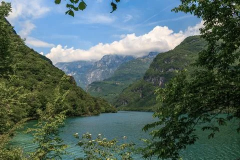 Tranquil lake  Mis  nestled between verdant  Dolomites  in Italy mountains .. Stock Photos