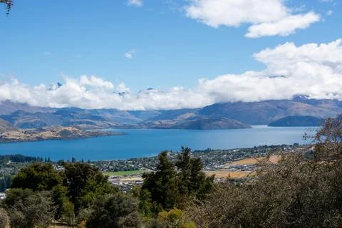 Tranquil Lake View Surrounded by Mountains Stock Photos