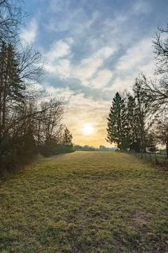 Tranquil Landscape Featuring Soft Clouds And Gentle Slopes In Sunlight Stock Photos