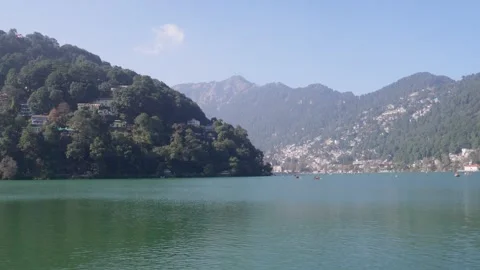 Tranquil Landscape of River and Mountain Homes Stock Footage 337631165