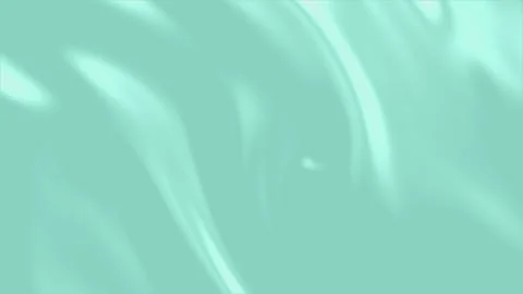 Tranquil Luxury: Slow Motion Flowing Waves of Smooth Green and Turquoise Silk Stock Footage 256810213