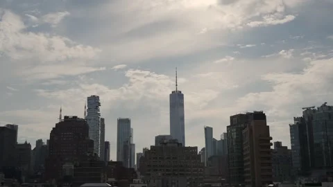 Tranquil Morning Scene Showcasing Skyscraper Silhouettes Against Layered Horizon Video stock 323770818