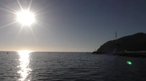 Tranquil morning sun in Avalon dive bouys and rock jetty bath in the sun Video stock 67890296