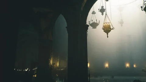 Tranquil mosque decor featuring hanging lamps and warm sunlight Stock Footage 340666377