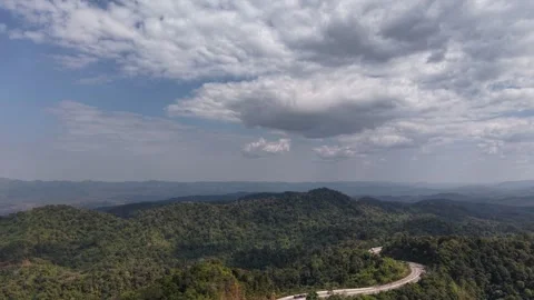 Tranquil Mountain Highway Surrounded by Nature Stock Footage 327505891