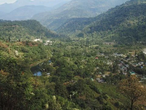 A tranquil mountain village, featuring rustic homes and breathtaking views Stock Photos