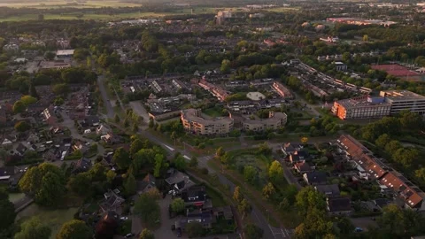 Tranquil neighborhood bathed in the warm glow of sunset Video stock 314071453