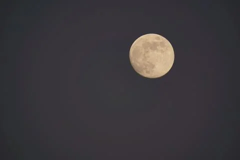 Tranquil Night Sky with a Full Moon and Plane Trail Stock Photos