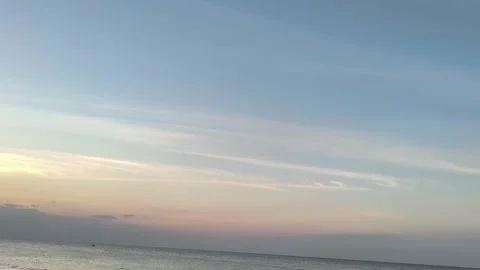 Tranquil Ocean Sunset with Soft Sky and Wispy Clouds at Dusk Stock Footage 341505711
