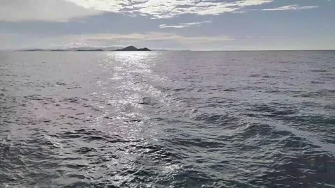 Tranquil Ocean View with Distant Islands at Labuan Bajo Stock Footage 279871744