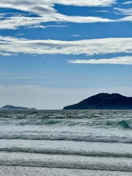 Tranquil ocean view with distant islands Stock Photos