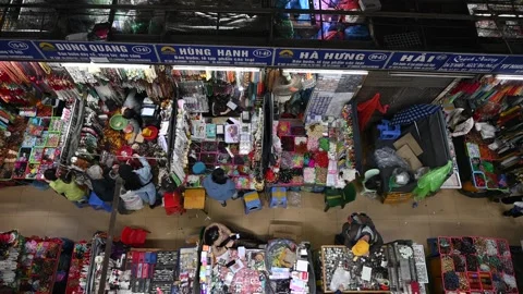 A Tranquil Overhead View of the Bustling Stalls at Dong Xuan Market Stock Footage 302841457
