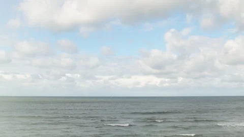 A tranquil panorama with smooth water and clouds. Stock Footage 341317014