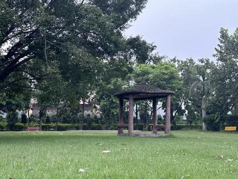 A Tranquil Park with a Gazebo Stock Photos