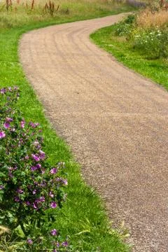 Tranquil  path in a meadow Stock Photos