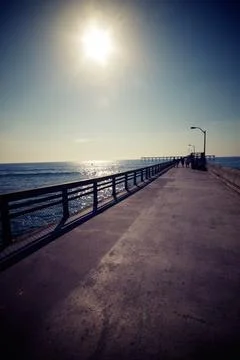 Tranquil Pier View Under Bright Sun Stock Photos