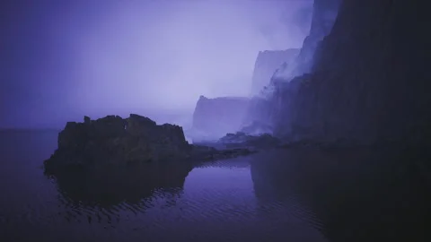 Tranquil pool in hidden bay shows colorful twilight reflections Stock Footage 335102197