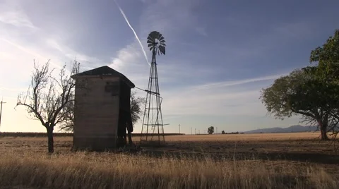Tranquil pump house and windmill Video stock 43330651