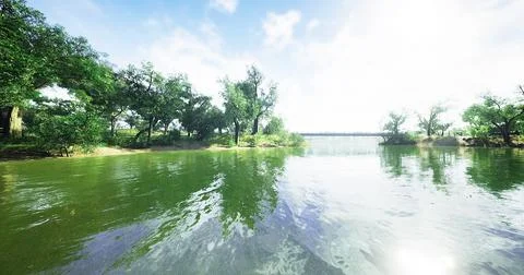 Tranquil river landscape seen under bright sunny sky with lush green trees Stock Illustration