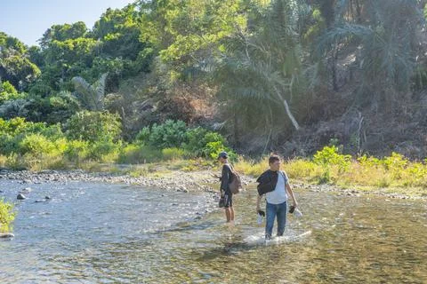 Tranquil Riverside Exploration Stock Photos