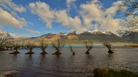 Tranquil Scene Of Fast Moving Clouds, Blue Sky And Snow Capped Mountain Video stock 106468175