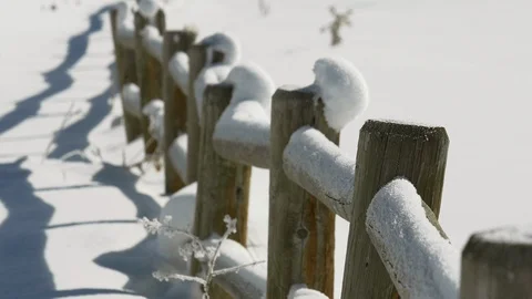 Tranquil scene of old white barn in winter with fence, Park City, UT. Stock Footage 99996101