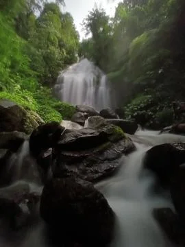 Tranquil scene of Parangkikis waterfall in slow speed shot Stock Photos