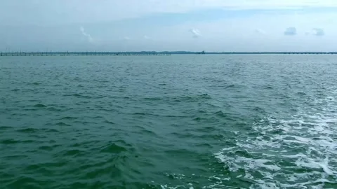 A tranquil scene of the sea with the camera starting at the water's surface Stock Footage 298930986