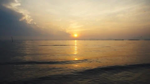 Tranquil scene of sunrise with cloudy sky over seascape in the morning. Stock Footage 93773631
