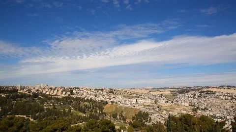 Tranquil scene as white clouds moving in majestic heaven over old Jerusalem Stock Footage 90963804