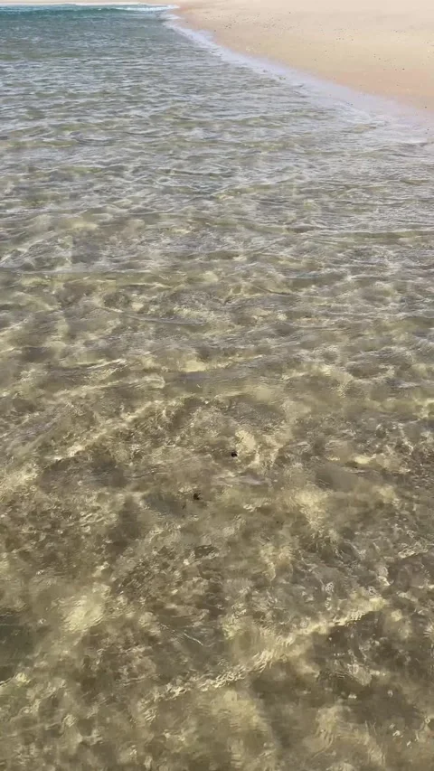 Tranquil sea , small waves breaking on beach sand Stock Footage 281909375