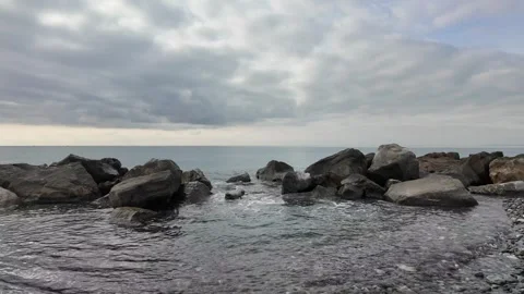 Tranquil Sea- Wave Breaking on Cliff Stock Footage 264758380
