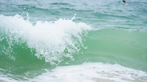 Tranquil Seascape: Close-up of Turquoise Wave Rolling to Shore Stock Footage 319511607