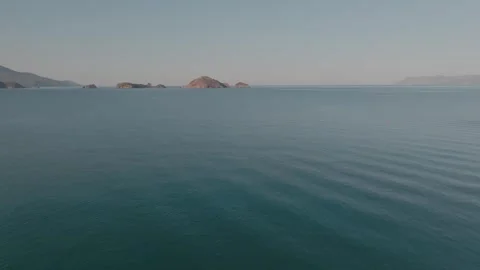 Tranquil Seascape with Distant Islands Stock Footage 282925228