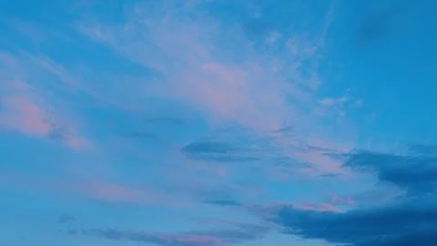 Tranquil Sky at Dusk Serene and Dreamy Cloud Patterns in Beautiful Blue and Pink Stock Photos