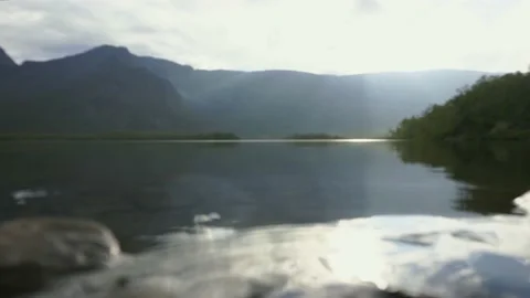Tranquil smoothness of a mountain lake Stock Footage 166119292